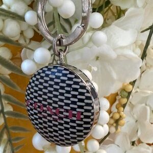 Coach Monochrome Keychain with Pink Logo